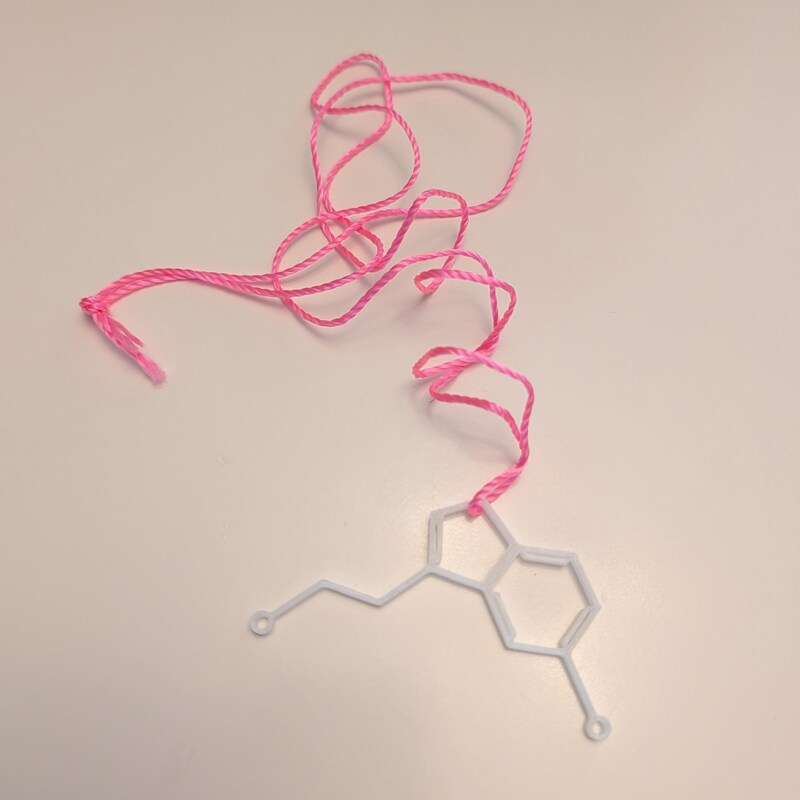 Glow in the dark serotonin necklaces